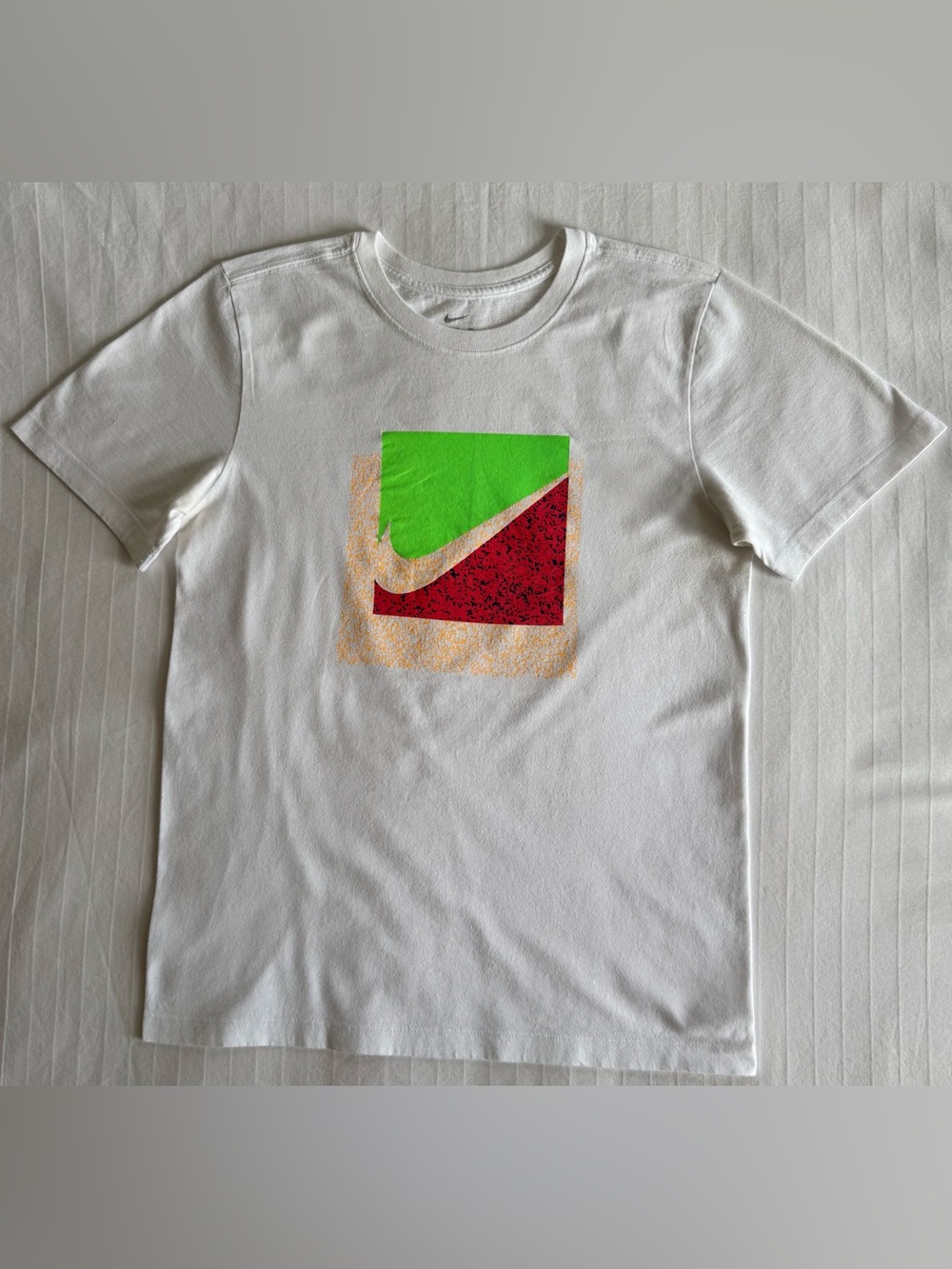 Nike Women’s White Tee with Green & Red Graphic Swoosh